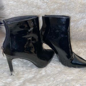 Shiny black boots